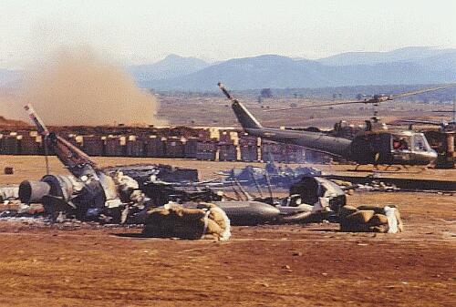 Smoldering Hueys on Flight Line