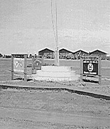 Unit Signs at 119th HQ and Hangers Across Airfield